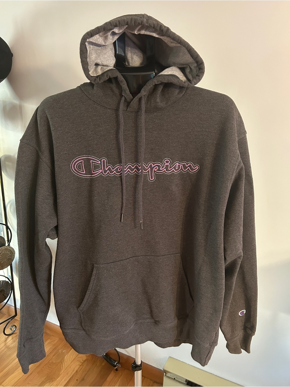 Champion Men’s Charcoal Gray Hoodie with Pink Outline Logo